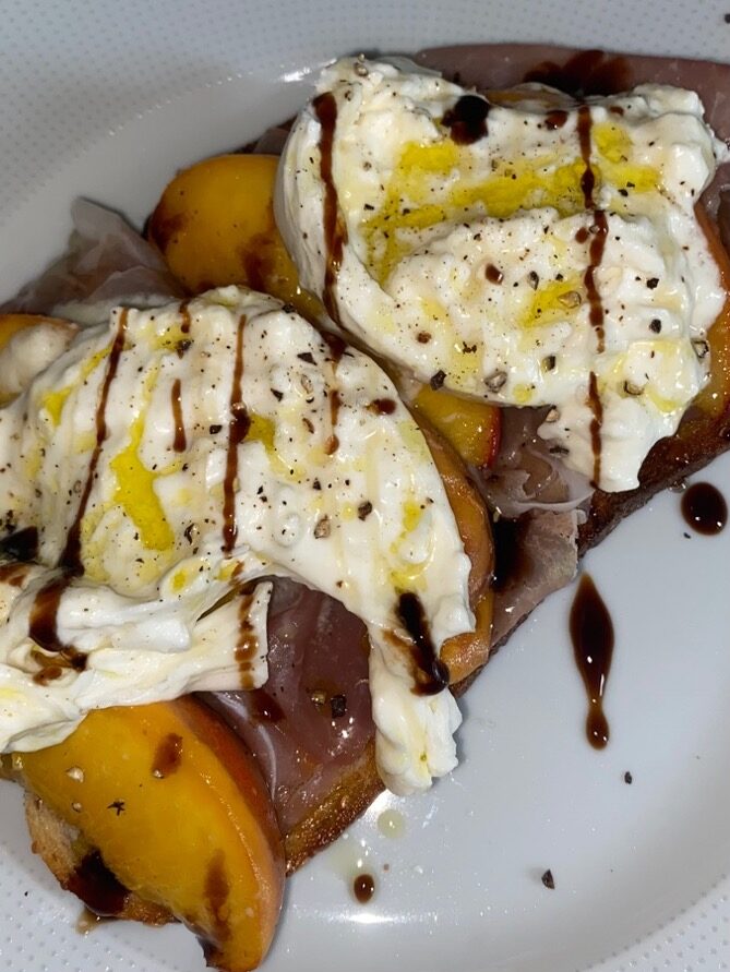 peach and prosciutto burrata toast